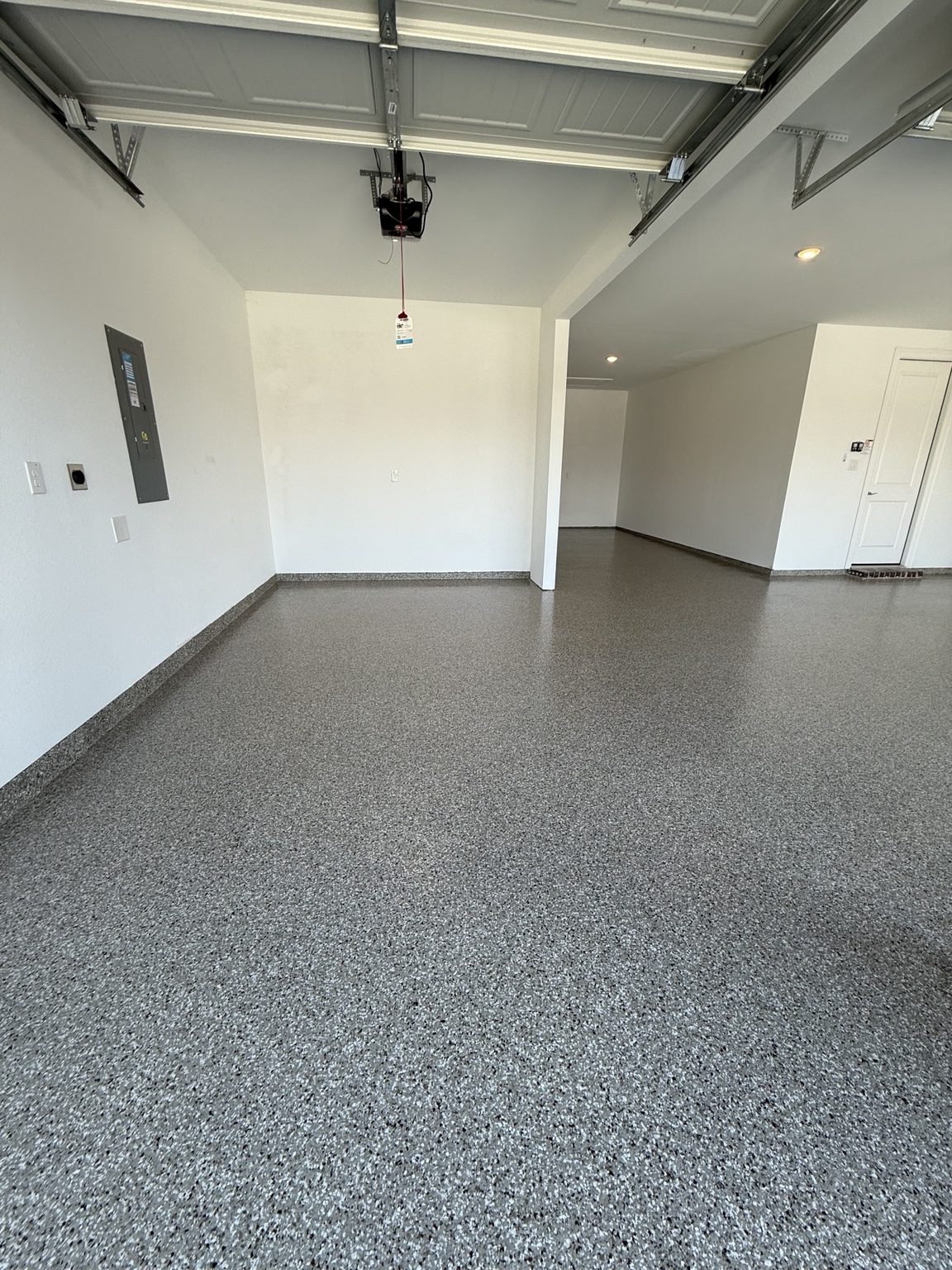 Second angle of the finished gray flake garage floor
